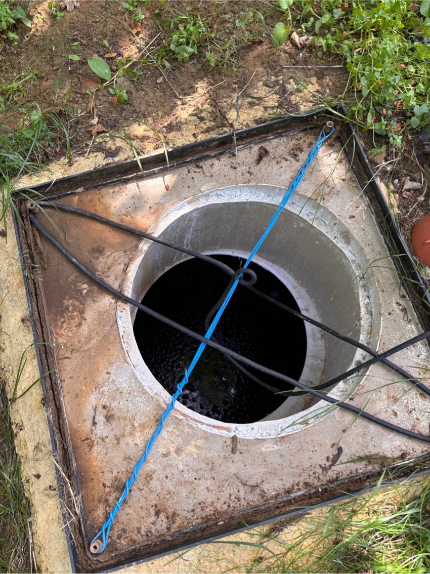 Cesspit tank access cover opened for emptying