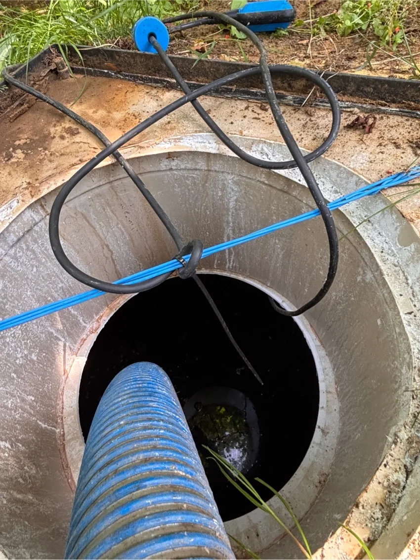 Tanker hose set up for cesspit emptying