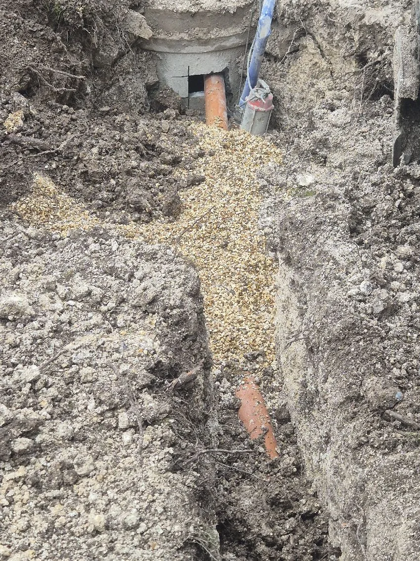 Main sewer connection trench backfilled and made good