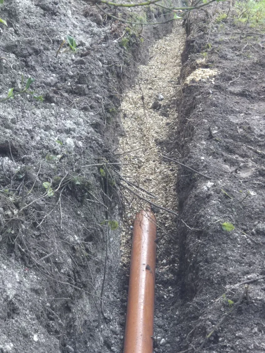 Excavated trench for main sewer connection in Headbourne Worthy