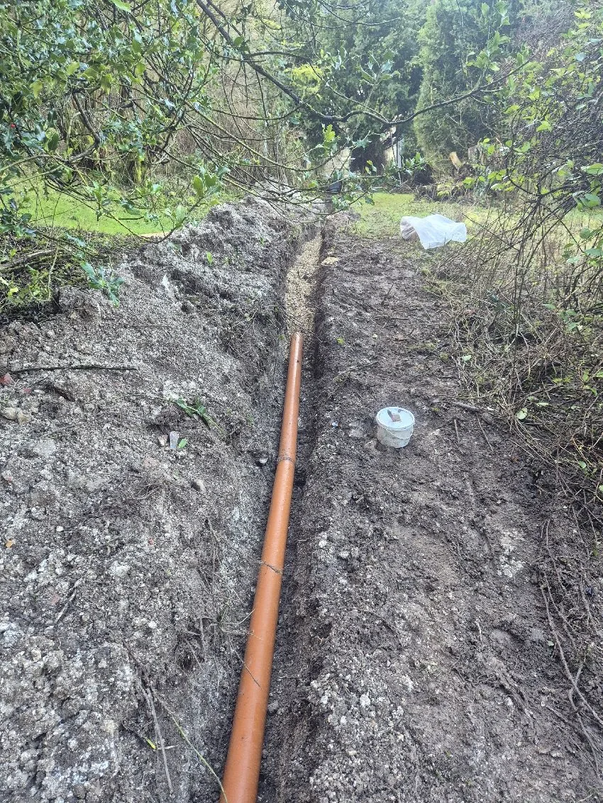 New drain run installed through the garden