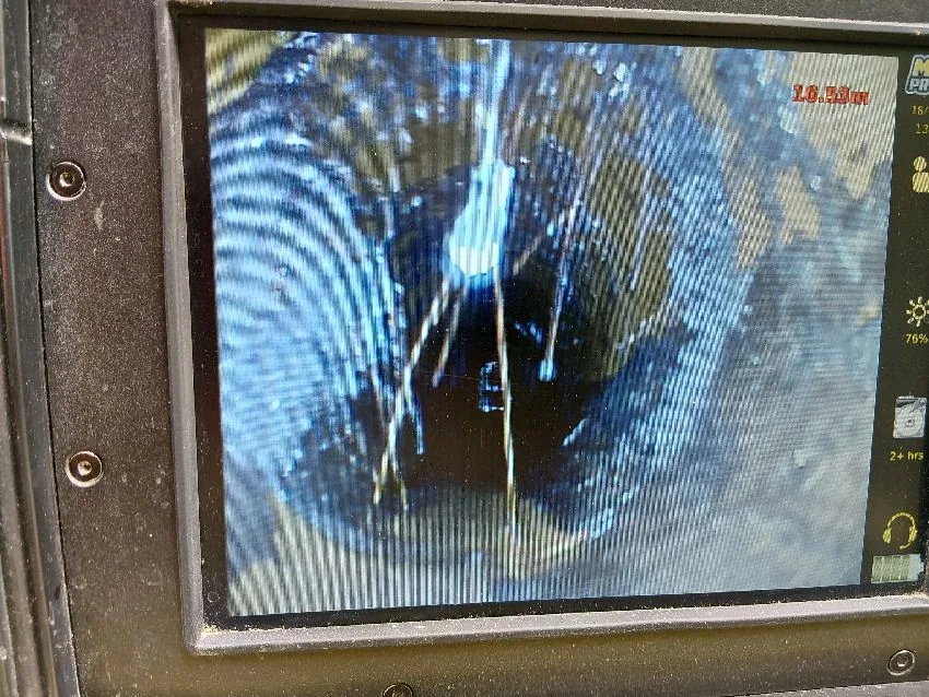 CCTV drain camera image showing pipe defect during Cobham pre-purchase drain survey