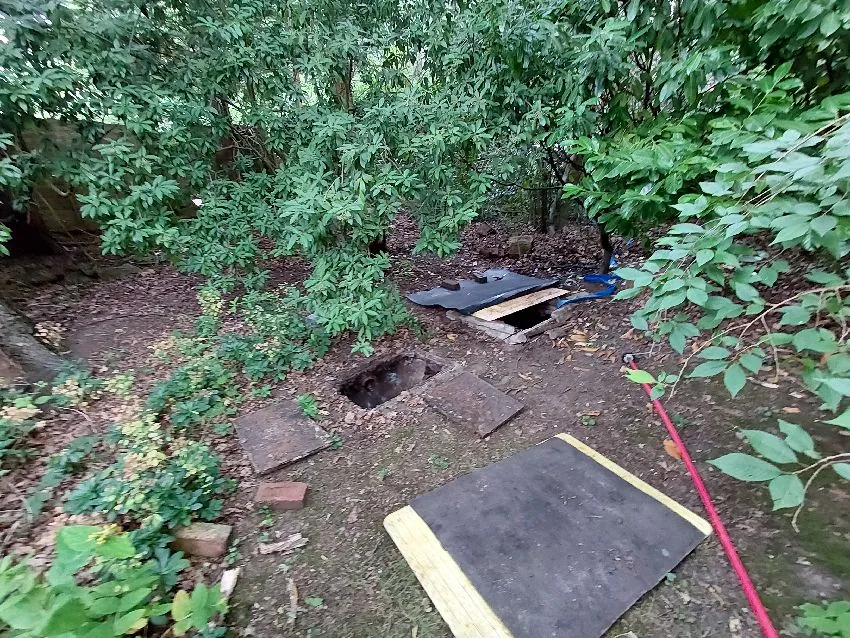Woodland septic tank access area inspected during drainage survey