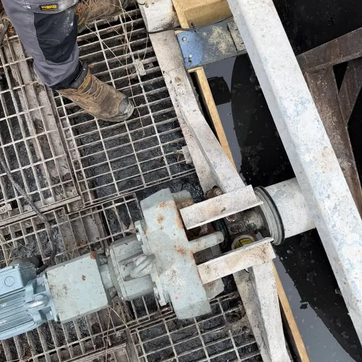 Mike standing on the grate of a Klargester BioDisc sewage treatment plant in Shepperton