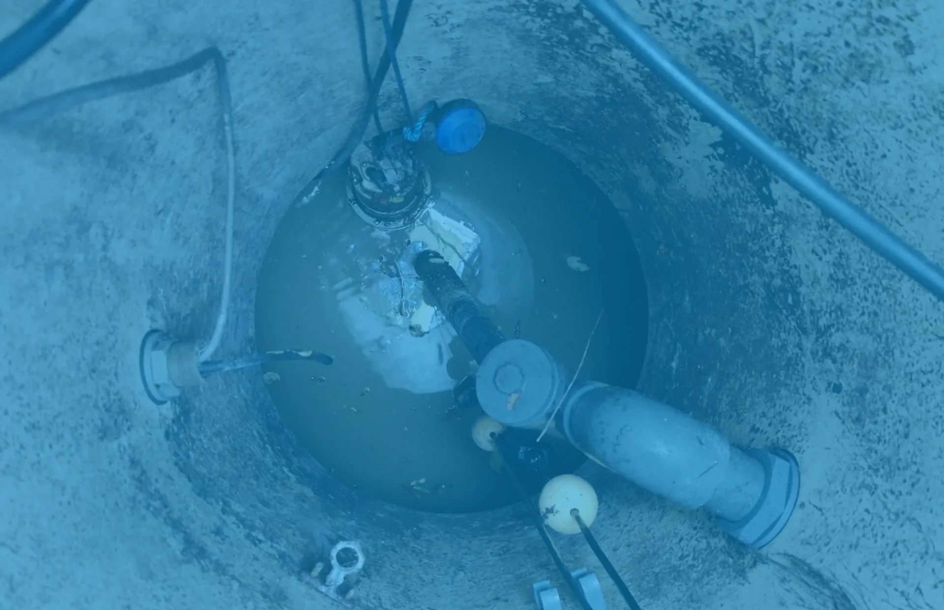 Submersible pump and pipework inside a pump station chamber